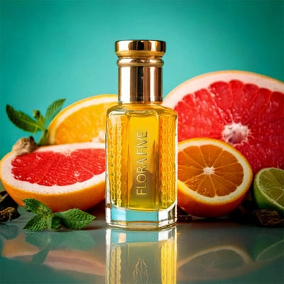 Bleu De Chanel Attar by Flora Five – oil-based perfume with fresh citrus notes of grapefruit, orange, and lime in a premium golden bottle