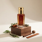 Burberry London inspired attar for men — alcohol-free perfume oil by Flora Five: red-amber oil on a walnut block with cinnamon, thyme, nutmeg and leather