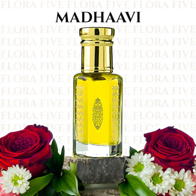 Madhaavi Attar by Flora Five — yellow oil in a bottle with a medallion print over red roses and daisies, under MADHAAVI lettering on a Flora Five pattern – 3, 6 and 12 ml