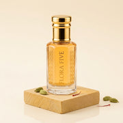 Mukhallat Al Badr Attar, unisex — alcohol-free perfume oil by Flora Five: golden amber oil on a sandstone block with cardamom pods and saffron
