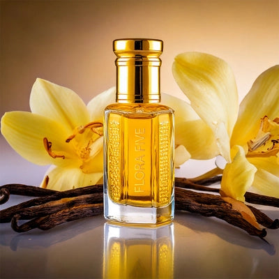 Musk Vanilla Attar by Flora Five – oil-based attar featuring creamy vanilla and soft musk notes in a luxurious golden bottle with vanilla flowers and pods