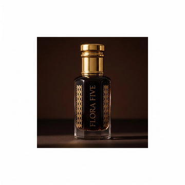 Dehn Al Oud Hindi for men — alcohol-free oud oil (oudh) by Flora Five: dark brown oil in a gold-capped bottle against a chocolate-brown backdrop