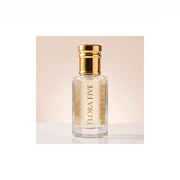 Mancera Coco Vanilla inspired attar for women — alcohol-free perfume oil by Flora Five: pale ivory oil in a gold-capped bottle on a blush-cream backdrop