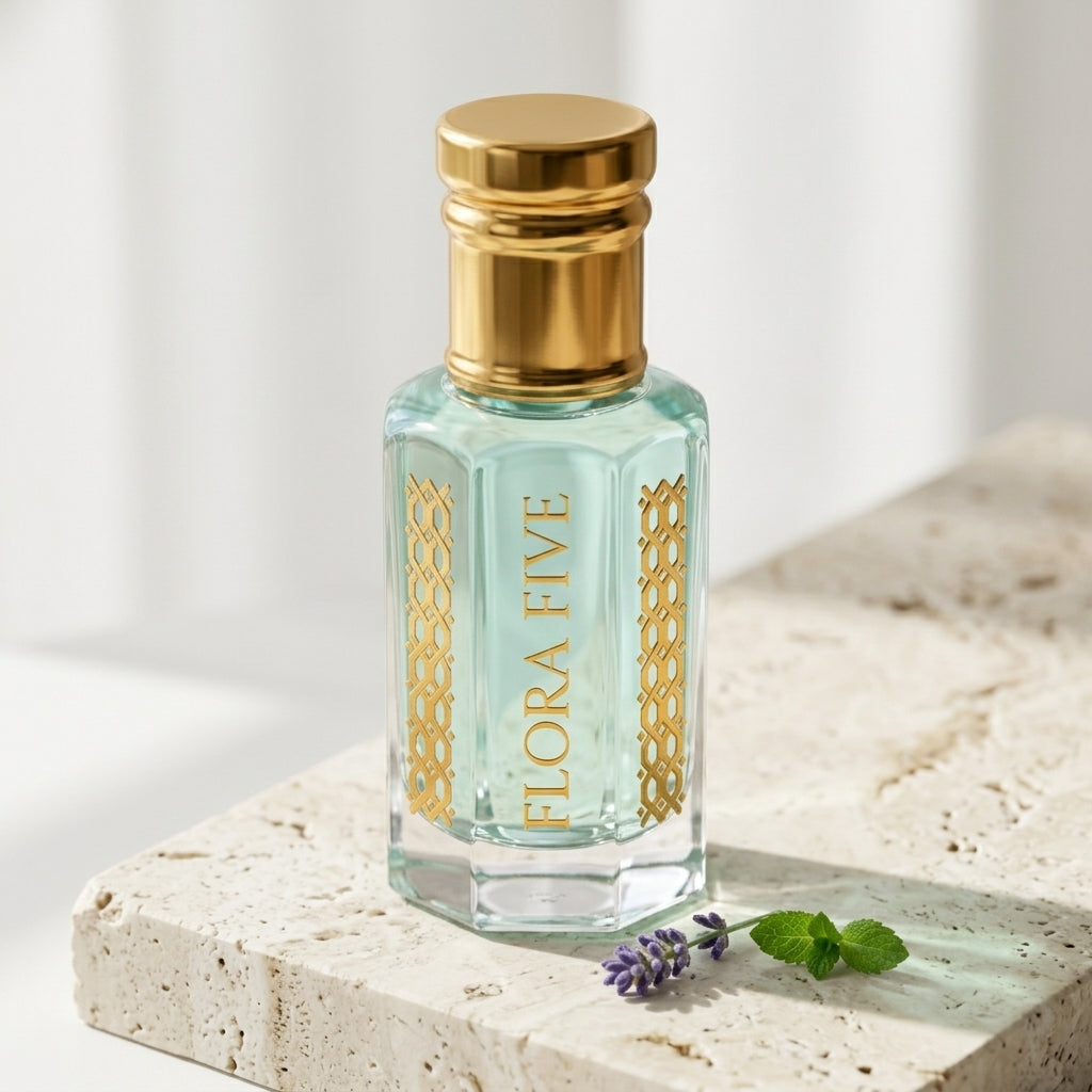Flora Five Aab attar – clear glass roll-on bottle with gold cap, aquatic fresh perfume oil