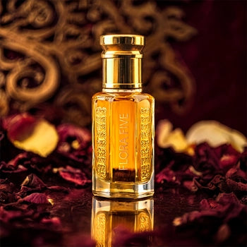 Amber Oudh Attar by Flora Five – handcrafted oil-based perfume with pure agarwood, rose, amber, and musk; deep, warm, and long-lasting fragrance in a premium golden bottle