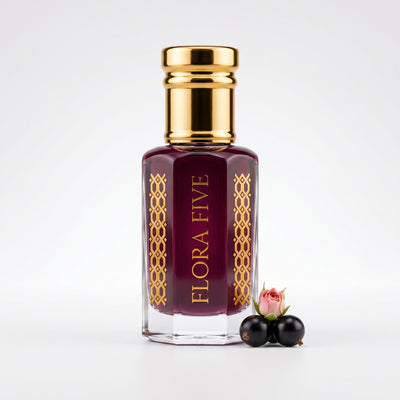 Armani Si inspired attar for women by Flora Five — alcohol-free perfume oil: gold-capped bottle of deep plum oil with a blackcurrant and a rosebud on white – 3, 6 and 12 ml