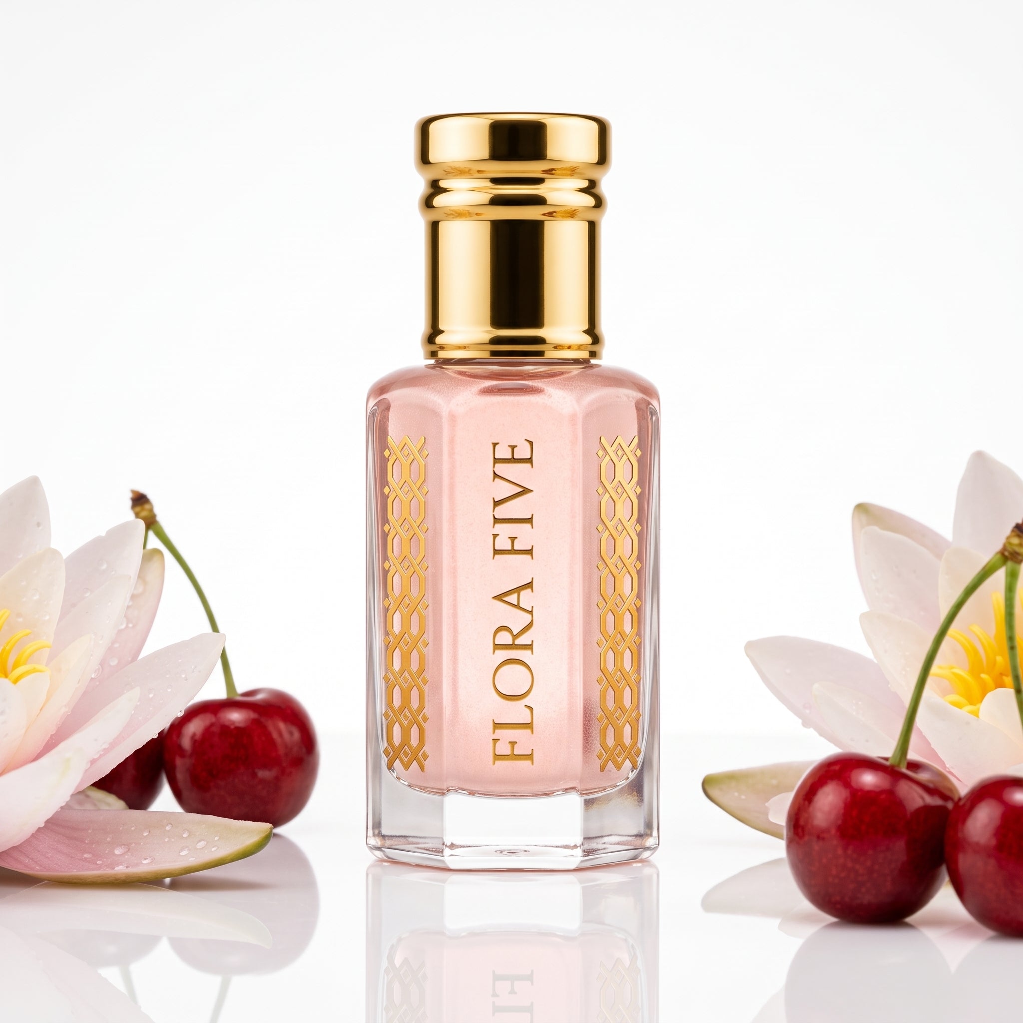 Bath & Body Works Pink Chiffon Inspired Attar by Flora Five — gold-capped bottle of pale pink oil with cherries and white lily petals on white – 3, 6 and 12 ml