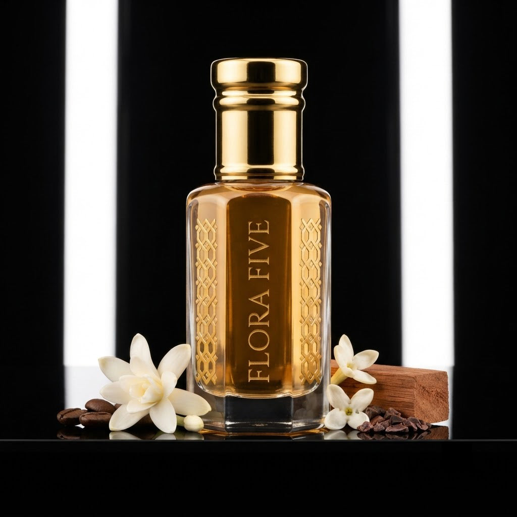 Carolina Herrera Good Girl Inspired Attar by Flora Five — gold-capped bottle of golden amber oil in a studio with tuberose and coffee beans – 3, 6 and 12 ml