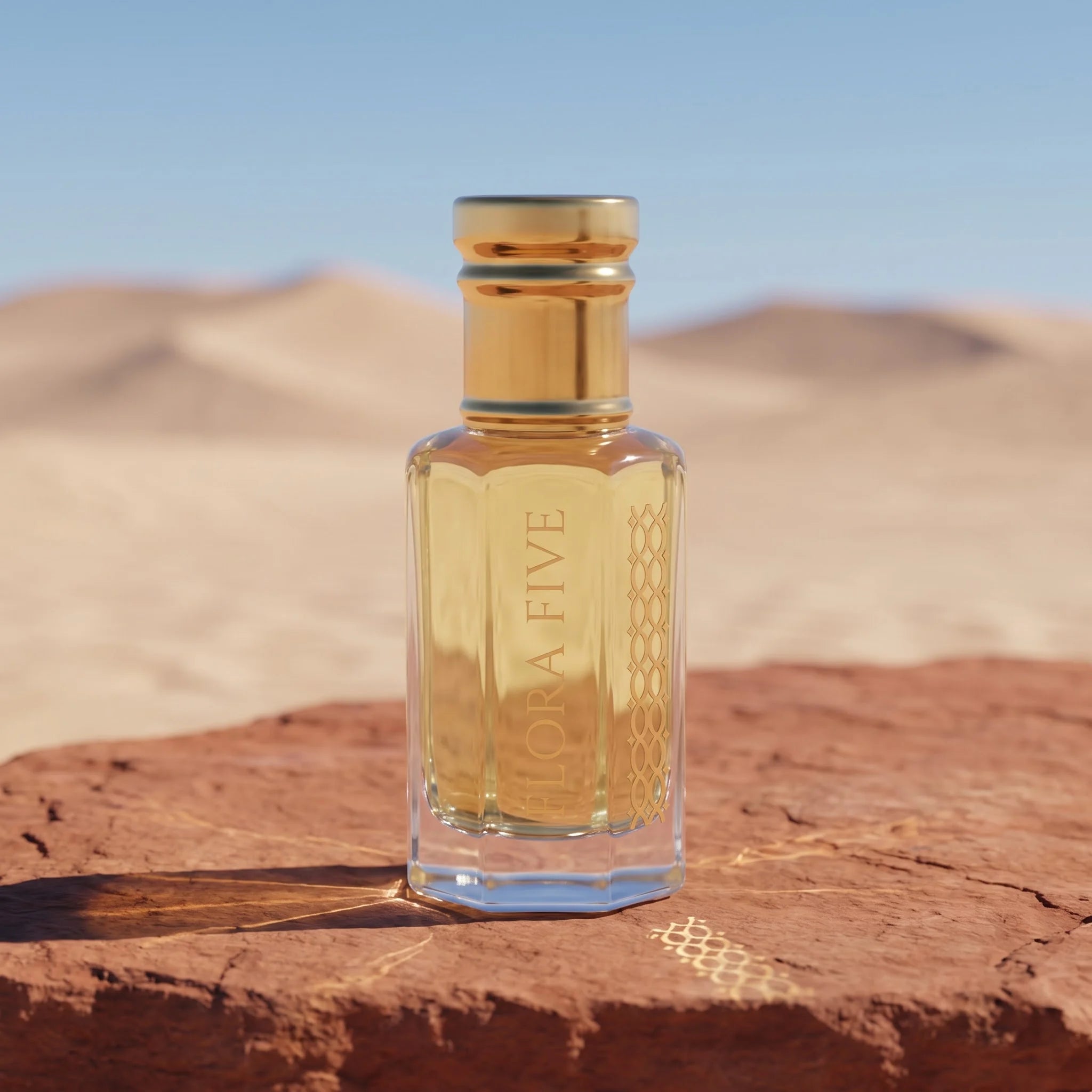 Dior Sauvage Inspired Attar by Flora Five — bottle on red sandstone in the open desert under a clear blue sky