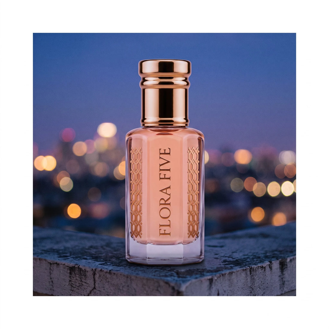 Gucci Paris Inspired Attar by Flora Five — rose-gold-capped bottle on a rooftop ledge against blue-hour city lights