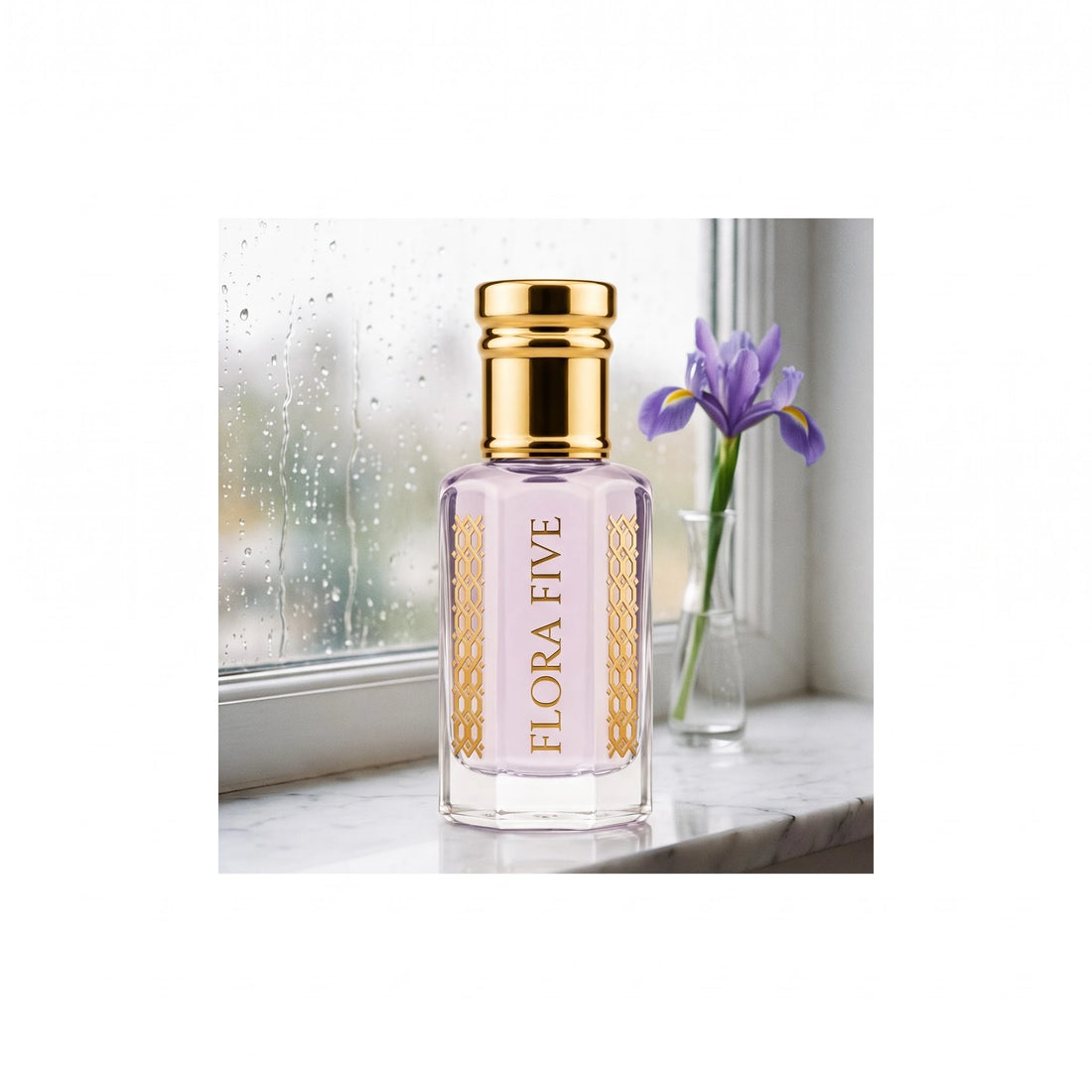 Iris Violet Attar by Flora Five — bottle on a marble windowsill beside an iris in a bud vase, rain on the glass