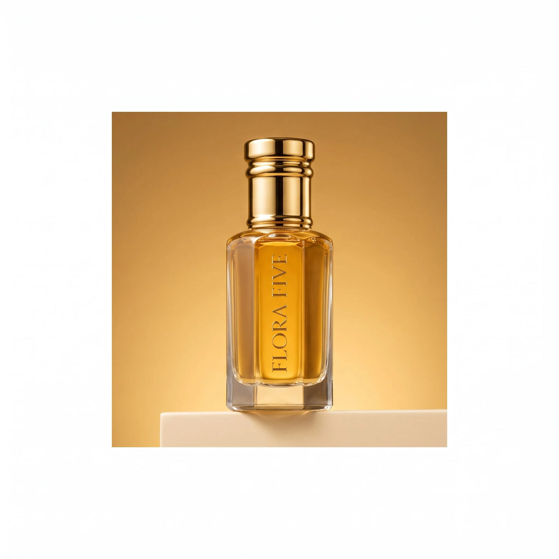 Kasturi Attar by Flora Five, alcohol-free attar oil: bottle on a honey-gold studio backdrop – 3, 6 and 12 ml