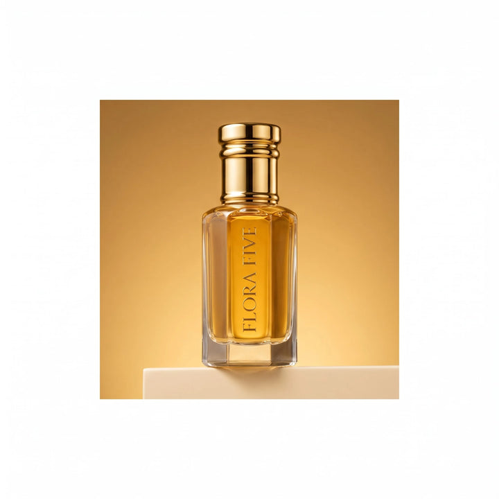 Kasturi Attar by Flora Five, alcohol-free attar oil: bottle on a honey-gold studio backdrop – 3, 6 and 12 ml