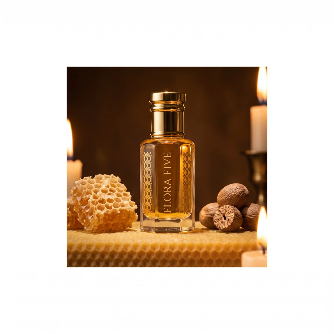 Kasturi Attar by Flora Five, alcohol-free attar oil: bottle by candlelight with honeycomb and nutmeg – 3, 6 and 12 ml