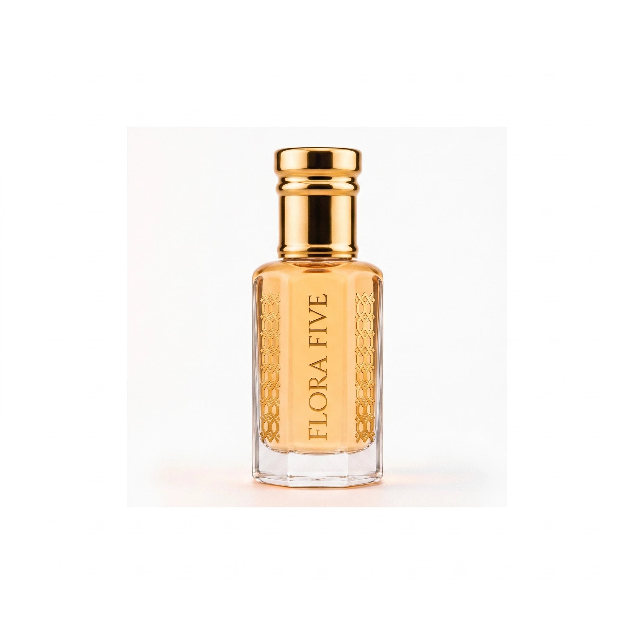 Louis Vuitton Imagination inspired attar for men — alcohol-free perfume oil by Flora Five: amber oil in a gold-capped bottle on a warm white backdrop