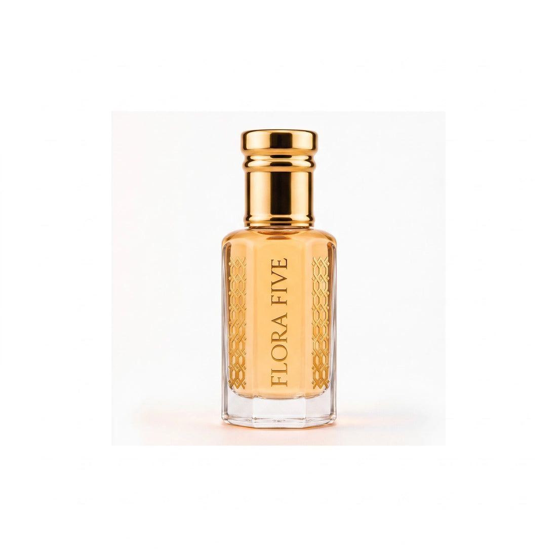 Louis Vuitton Imagination inspired attar for men — alcohol-free perfume oil by Flora Five: amber oil in a gold-capped bottle on a warm white backdrop