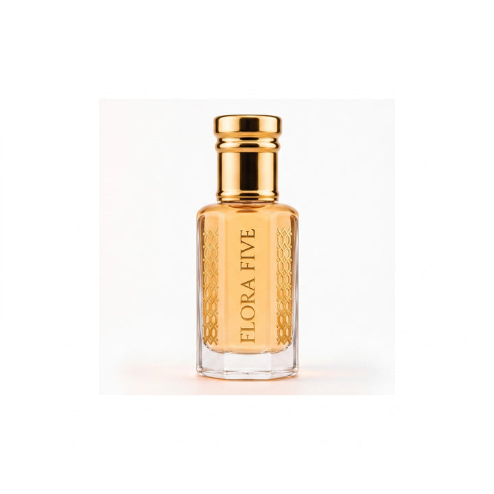 Louis Vuitton Imagination inspired attar by Flora Five, alcohol-free perfume oil: bottle on a white studio backdrop with warm light – 3, 6 and 12 ml