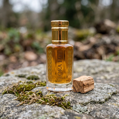 Tom Ford Arabian Wood inspired unisex attar — alcohol-free attar oil by Flora Five: amber oil on a mossy stone with a sandalwood block