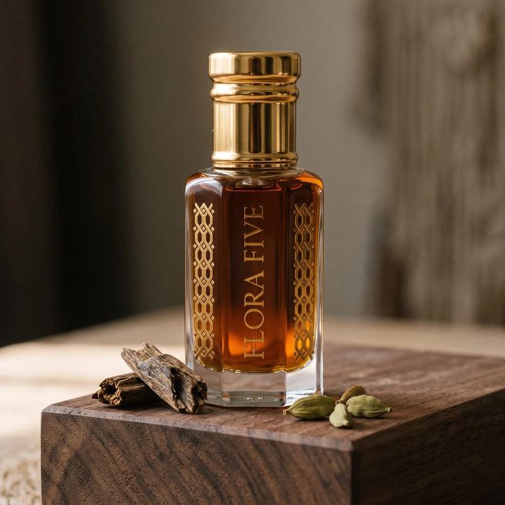 Tom Ford Oud Wood inspired unisex oud — alcohol-free oud oil (oudh) by Flora Five: amber-brown oil on walnut with agarwood chips and cardamom