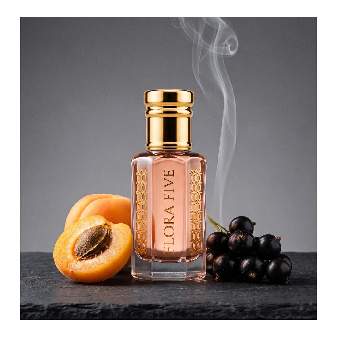Wesal Attar by Flora Five, alcohol-free attar oil: bottle with apricot, blackcurrants and frankincense smoke on slate – 3, 6 and 12 ml