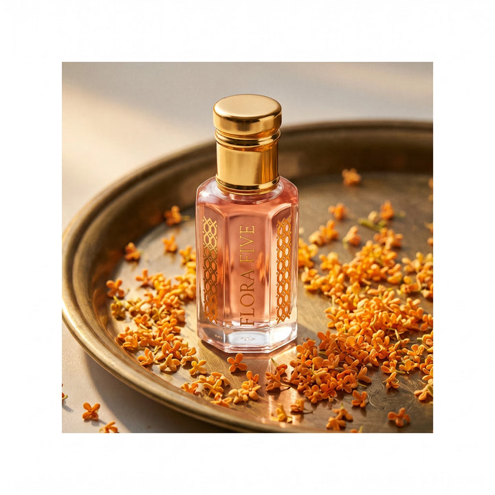Wesal Attar by Flora Five, alcohol-free attar oil: bottle on a brass tray with osmanthus blossoms – 3, 6 and 12 ml