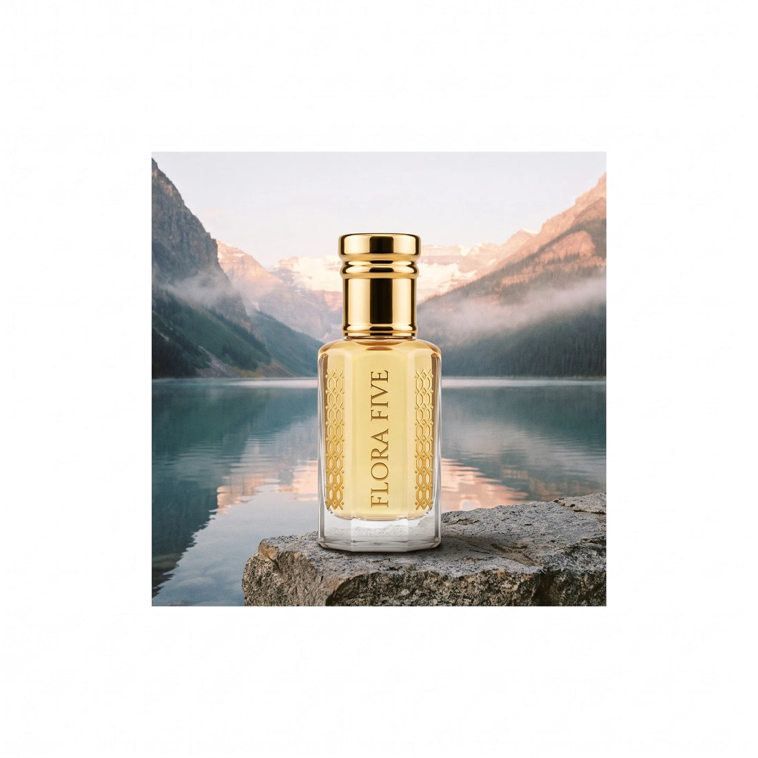 YSL Y Inspired Attar by Flora Five — bottle on a rock by a misty mountain lake