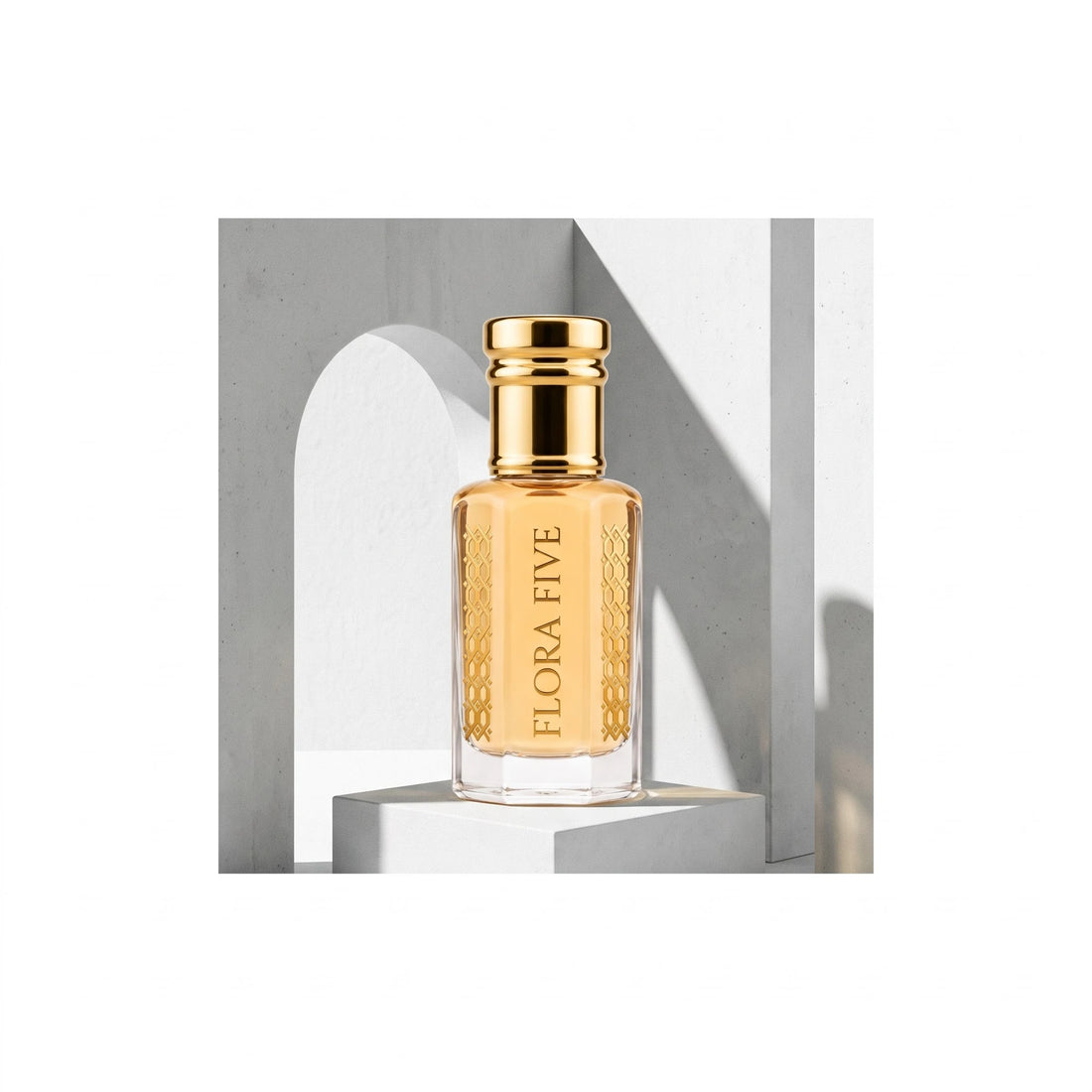 YSL Y Inspired Attar by Flora Five — bottle of amber-gold oil on a white plinth among arched modernist walls